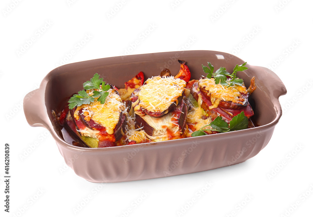 Dish of tasty baked vegetables on white background Dish of tasty baked vegetables on white background