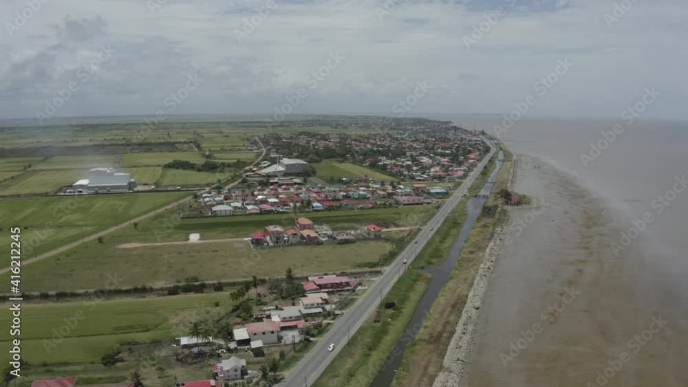 Urban settlements next to river and agriculture fields Urban settlements next to river and agriculture fields