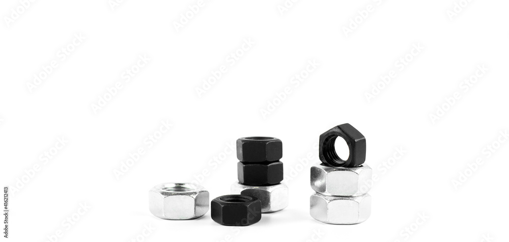 Steel nuts screws on a white background. Thread Steel nuts screws on a white background. Thread
