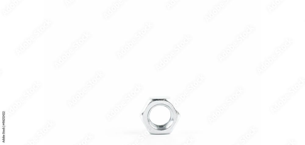 Steel nuts screws on a white background. Thread Steel nuts screws on a white background. Thread