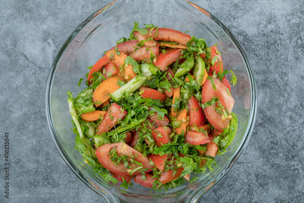 Fresh vegetable salad on in glass bowl Fresh vegetable salad on in glass bowl
