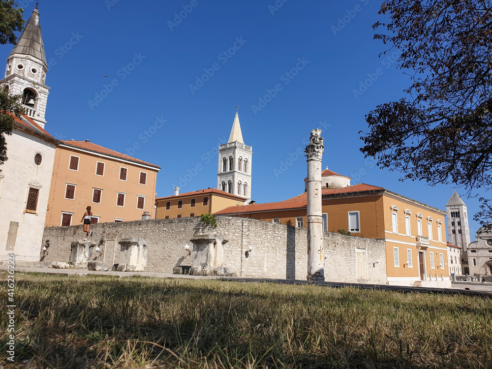 Bell towers of Ilya church, Anastasia cathedral, holy Mary church, roman column and dome of Donat church in town Zadar