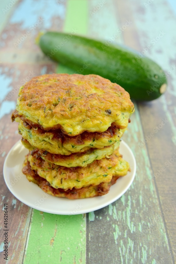 Delicious fried zucchini fritters. Selective focus