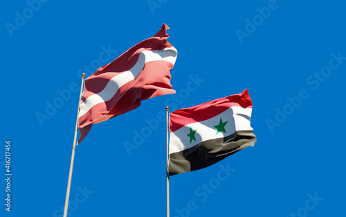 Flags of Syria and Latvia.