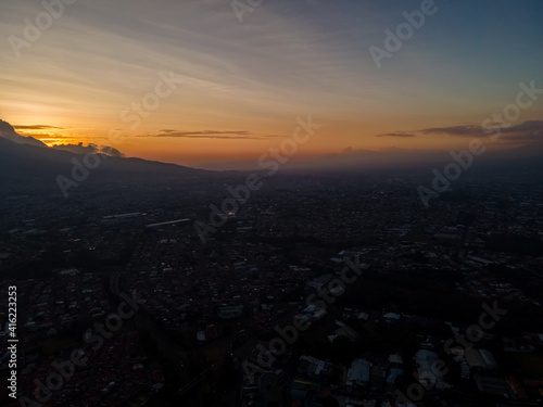 Beautiful aerial view of the City of San Jose Costa Rica, Its park Sabana, buildings at sunset 