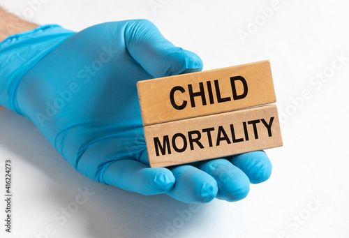 Child mortality inscription, infant death rate concept photo