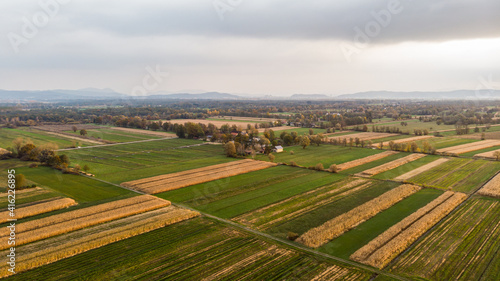 Aerial view of empty autumn fields at sunset.