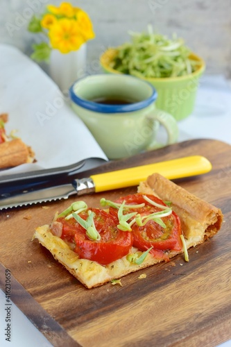 Tomato tart with mung bean sprouts. Selective focus