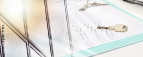 House keys on an amortization schedule; multiple exposure