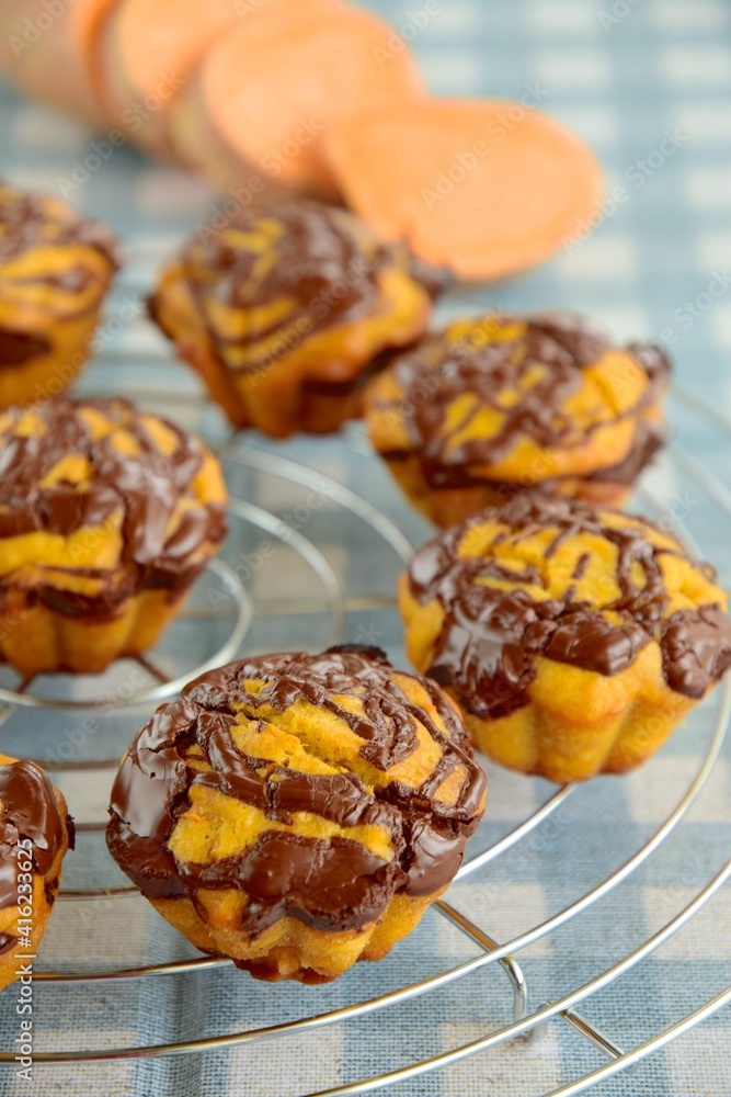 Sweet potato muffins with chocolate sauce topping Sweet potato muffins with chocolate sauce topping