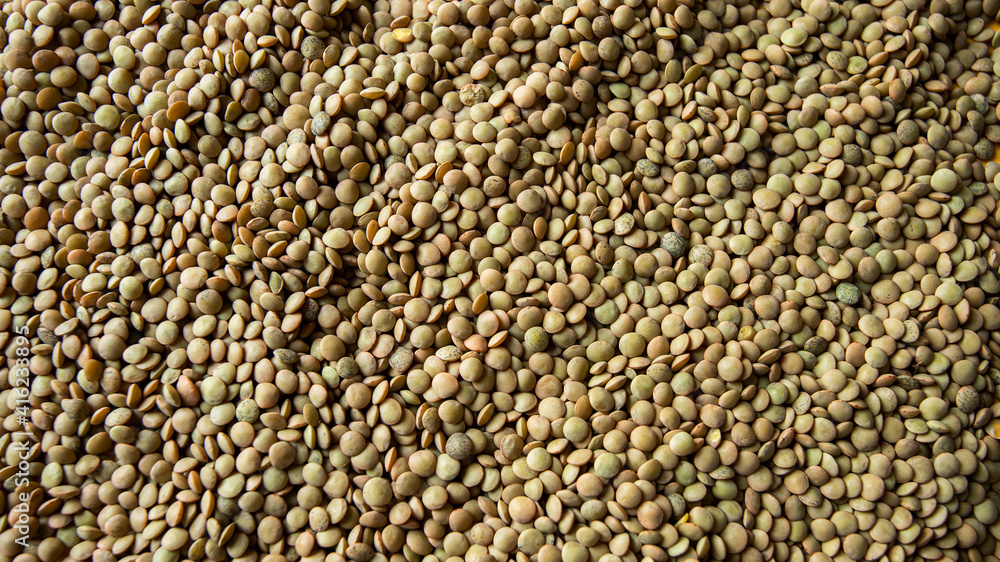 Close up of dry lentils texture on large background for banner. Close up of dry lentils texture on large background for banner.