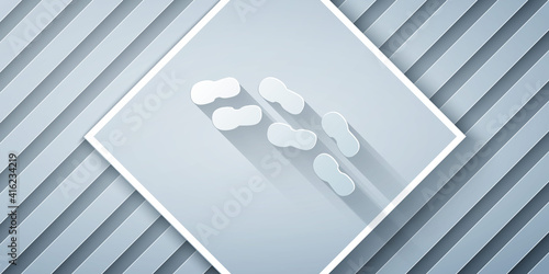 Paper cut Human footprints shoes icon isolated on grey background. Shoes sole. Paper art style. Vector.