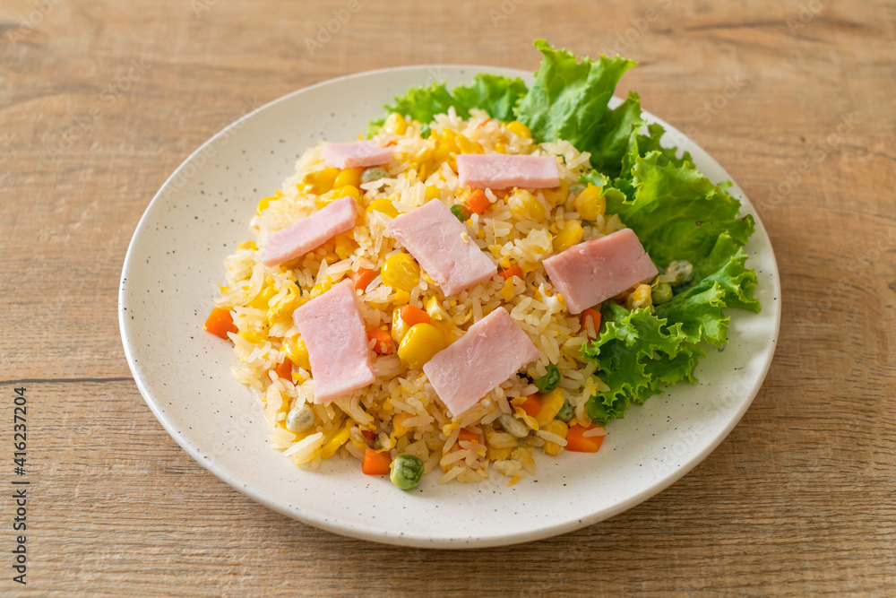 fried rice with ham and mixed vegetable (carrot, green bean peas, carrot) fried rice with ham and mixed vegetable (carrot, green bean peas, carrot)
