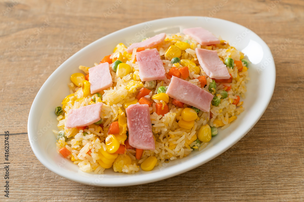 fried rice with ham and mixed vegetable (carrot, green bean peas, carrot) fried rice with ham and mixed vegetable (carrot, green bean peas, carrot)