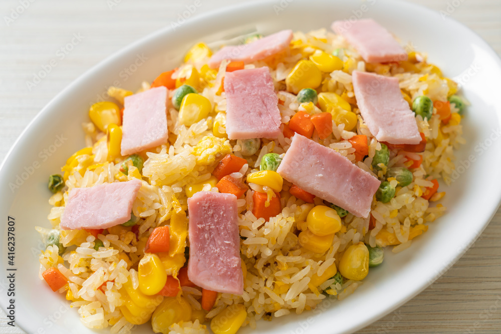 fried rice with ham and mixed vegetable (carrot, green bean peas, carrot) fried rice with ham and mixed vegetable (carrot, green bean peas, carrot)