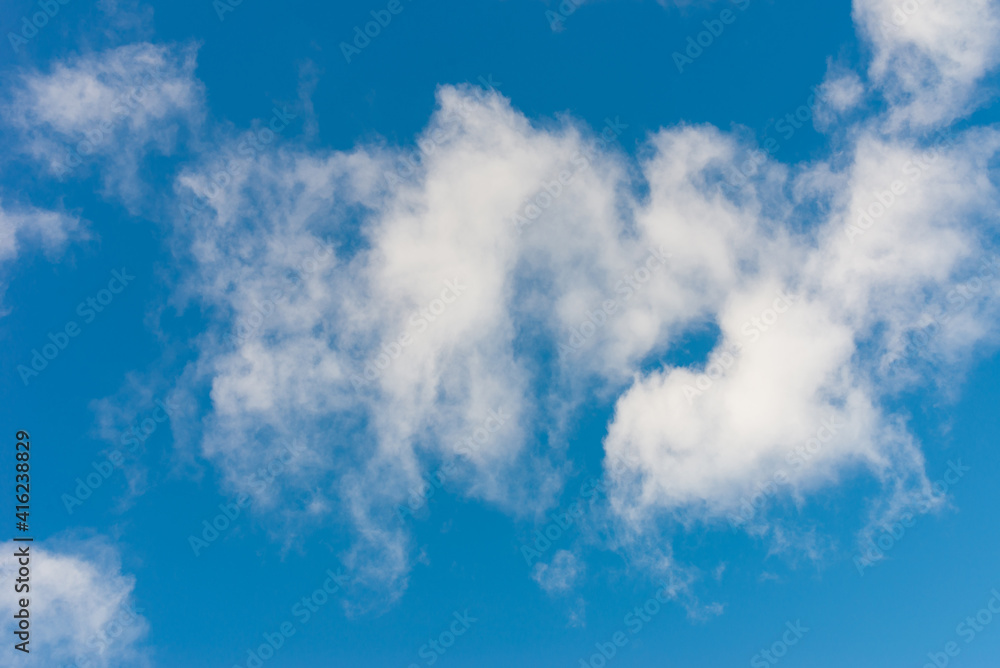 Fototapeta premium White clouds in blue sky.Winter clouds blue heaven background.