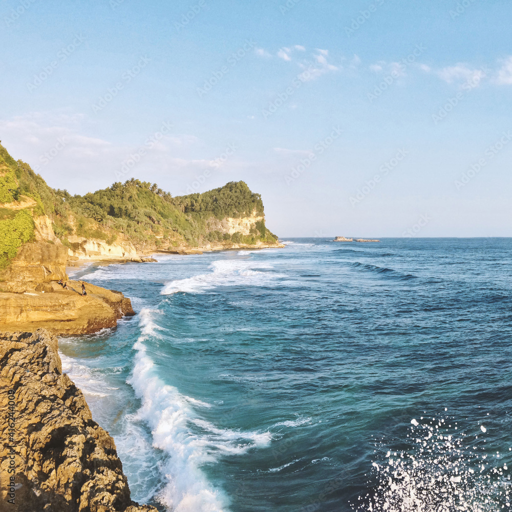 Fototapeta premium Stunning view, Crystal clear water & white sand beach at Banyu Tibo Beach Pacitan East Java Indonesia
