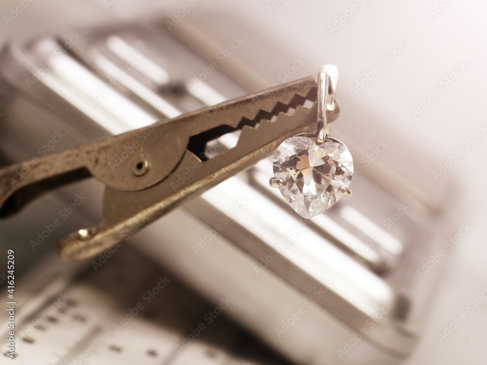 Silver earrings with a stone in a pawn shop