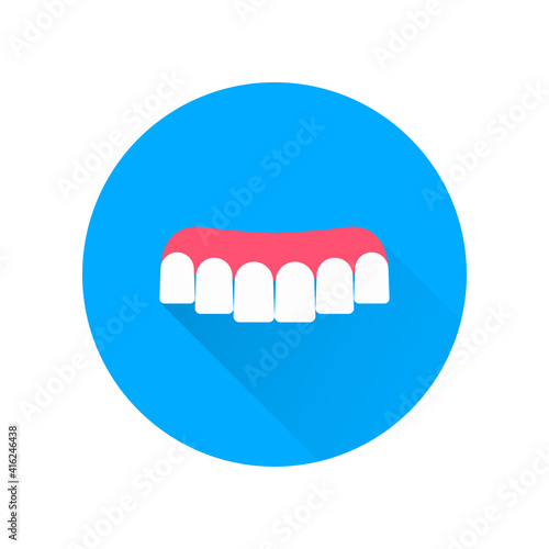 Removable dentures with long shadow. Sign for dentistry clinic. Orthodontics concept.