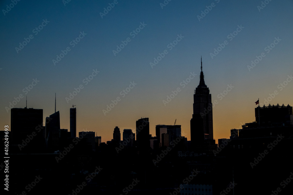 new york city skyline at sunset