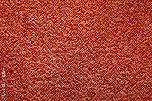 Brown fine grain leather texture background © andersphoto
