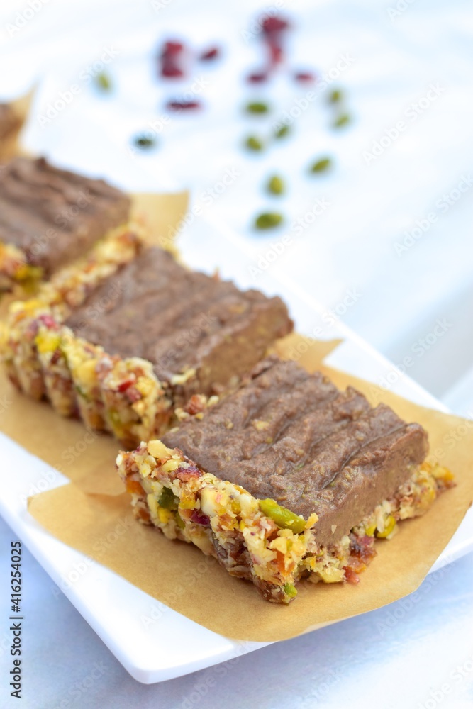 Chocolate avocado tart with pistachio date almond cranberry crust Chocolate avocado tart with pistachio date almond cranberry crust