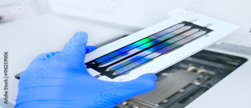 Obraz na płótnie next generation sequencing flow cell. genetic engineering, genetic modification, designer baby and cloning concept. cancer screening and medical technology and therapy. banner with copy space w salonie