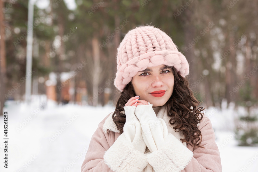 Pleased brunette lady wears winter outfit outdoor Pleased brunette lady wears winter outfit outdoor