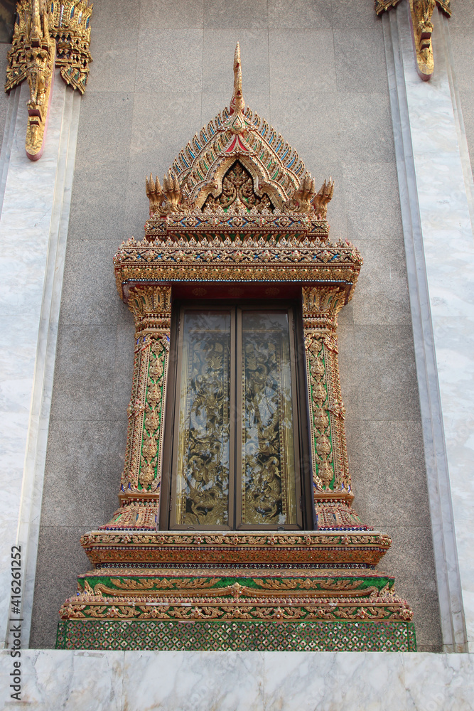 buddhist  temple (wat intharavihan) in bangkok (thailand)