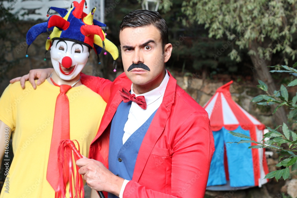 Circus tamer and a clown