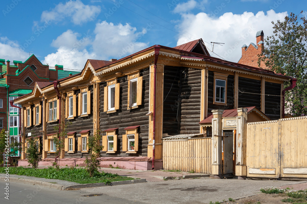 Tomsk, an old wooden apartment building Tomsk, an old wooden apartment building