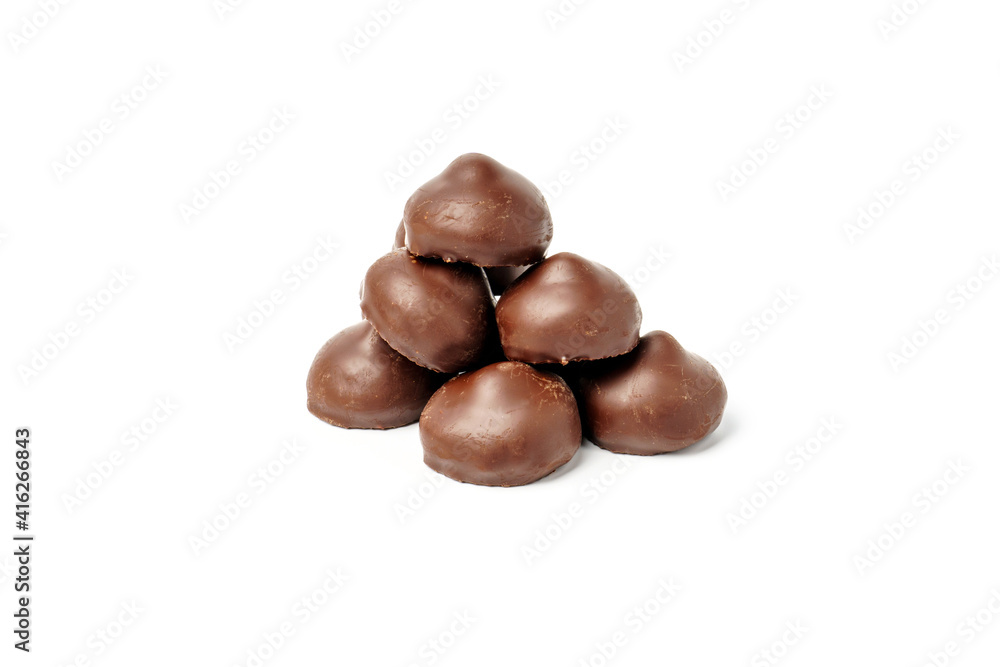 Chocolates from dark chocolate isolated on white Chocolates from dark chocolate isolated on white