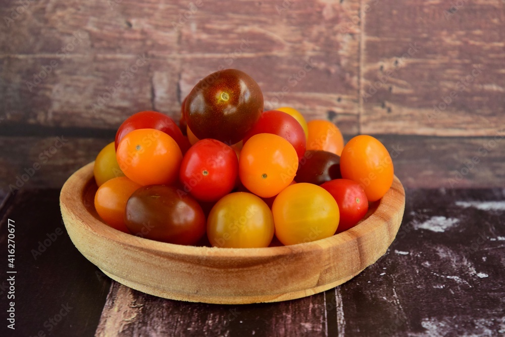Assorted colourful fresh cherry tomatoes 