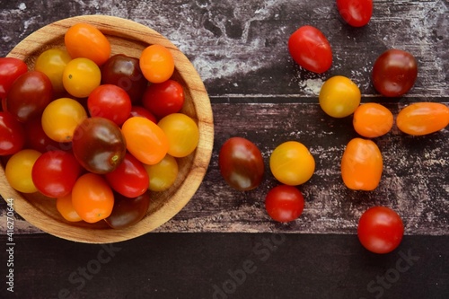Assorted colourful fresh cherry tomatoes. Flat lay