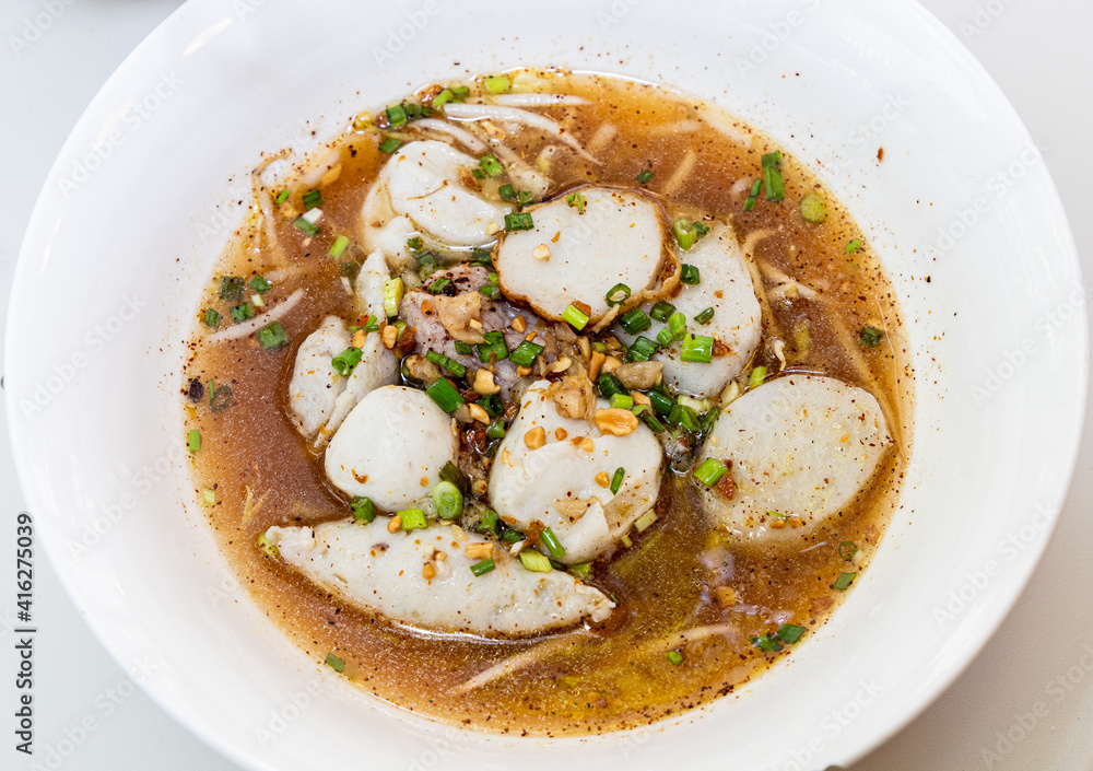 Spicy Thai style noodle on white table Spicy Thai style noodle on white table