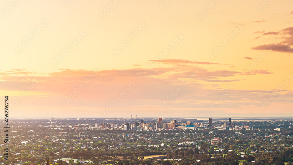 Spectacular view of Adelaide city skyline at dusk viewed from the Adelaide Hills