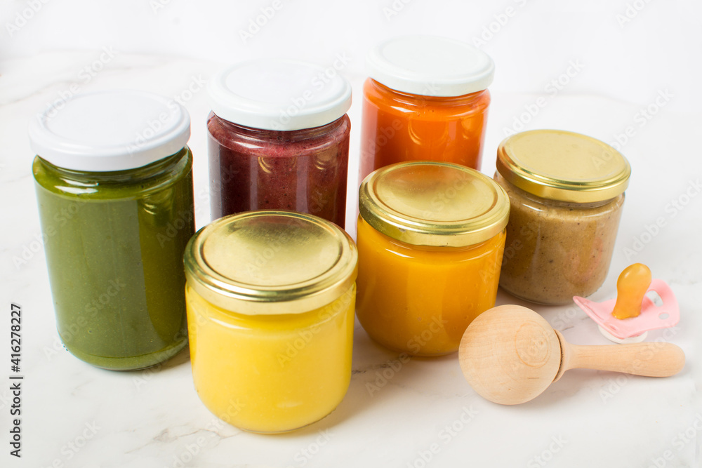 Variety of homemade baby vegetable and fruit puree Variety of homemade baby vegetable and fruit puree
