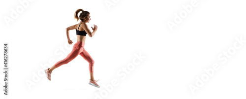 Flyer. Young caucasian female model in action, motion isolated on white background with copyspace. Concept of sport, movement, energy and dynamic, healthy lifestyle. Training, practicing.