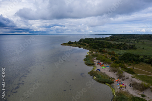 Wallpaper Mural Aerial drone view of  Baltic Sea coast in Hel peninsula, Jastarnia. Drak clouds by the Puck Bay in Poland. Torontodigital.ca