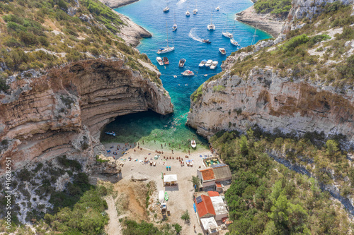 Canvas Print Aerial drone shot of iconic Stiniva cove beach of Adriatic sea on Vis Island in
