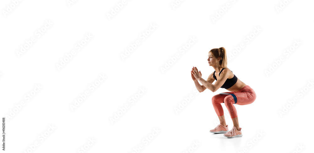 Flyer. Young caucasian female model in action, motion isolated on white background with copyspace. Concept of sport, movement, energy and dynamic, healthy lifestyle. Training, practicing. Flyer. Young caucasian female model in action, motion isolated on white background with copyspace. Concept of sport, movement, energy and dynamic, healthy lifestyle. Training, practicing.