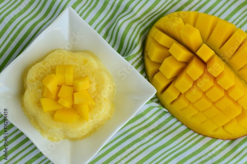 Fototapeta Naklejka Na Ścianę i Meble -  Mango pudding with cubed fresh mango on top