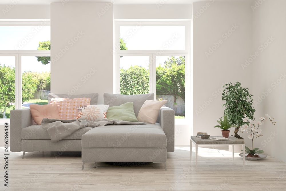 White living room with sofa and summer landscape in window. Scandinavian interior design. 3D illustration White living room with sofa and summer landscape in window. Scandinavian interior design. 3D illustration