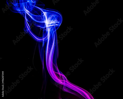 Colored smoke on black background