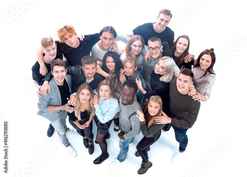 group of happy young people pointing at the camera.