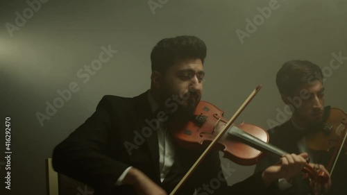 the string quartet plays classical music,medium shoot