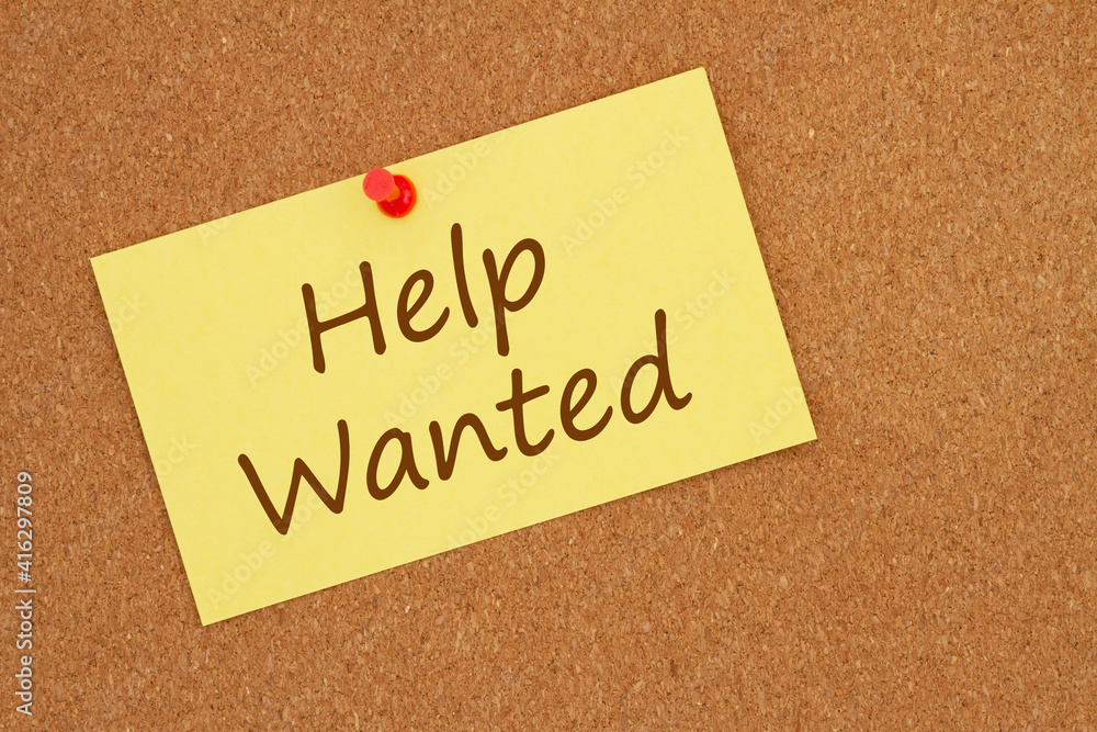 Help wanted message on index card on bulletin board Help wanted message on index card on bulletin board