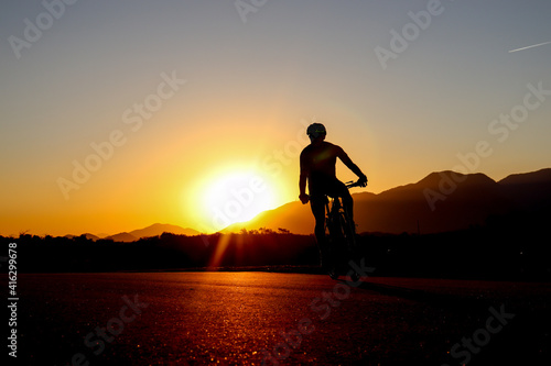 Fototapeta Naklejka Na Ścianę i Meble -  silhouette of a person on a sunset