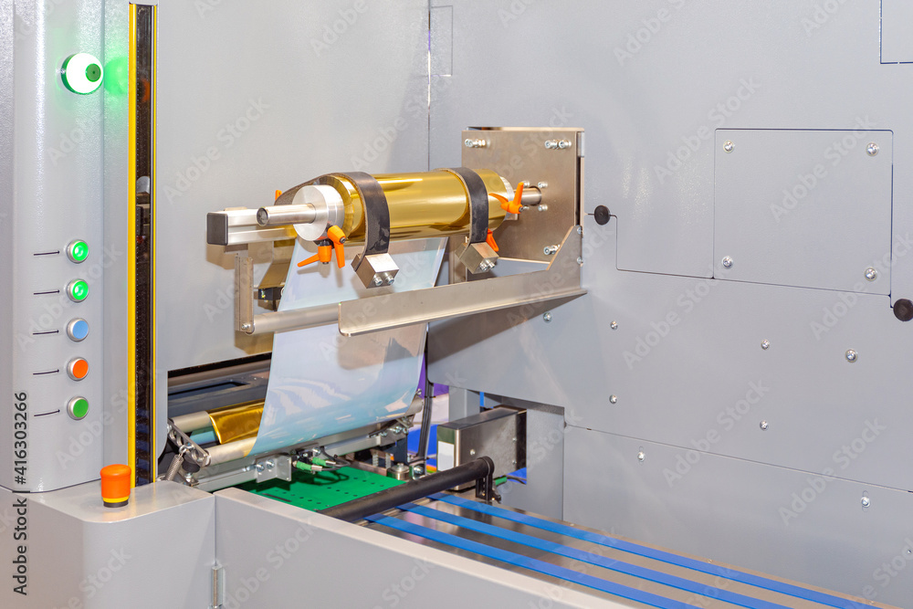 Gold Foil Machine StockFoto Adobe Stock