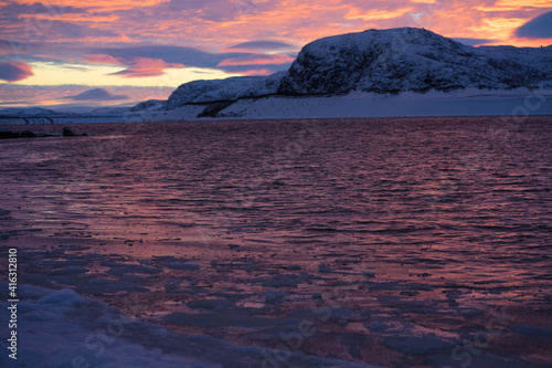 arctic ocean at red sunset